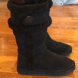 Michael Kors black shearling boots.